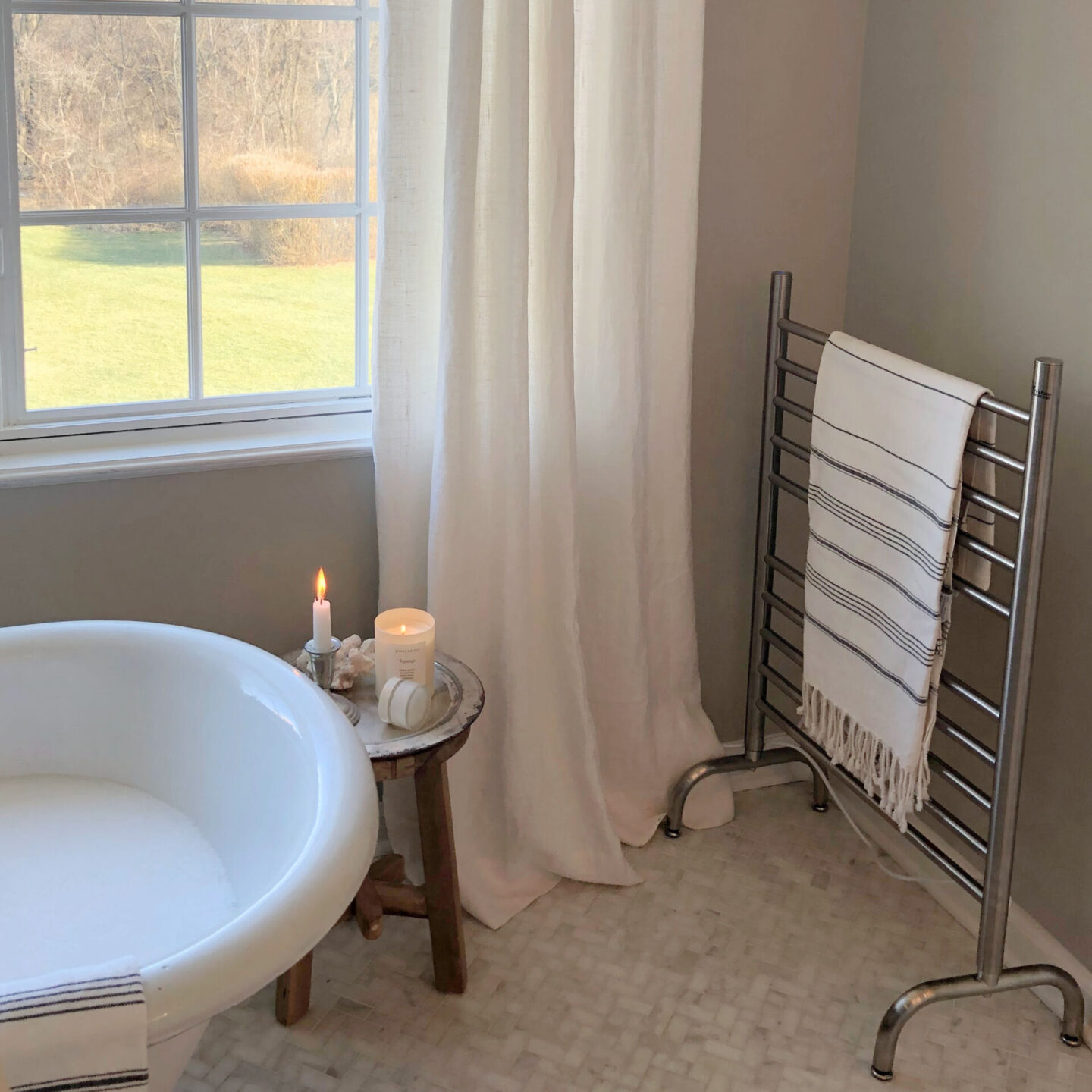 Hello Lovely's renovated bath (SW Repose Gray on walls) with Amba Solo 24" Freestanding Towel Warmer.