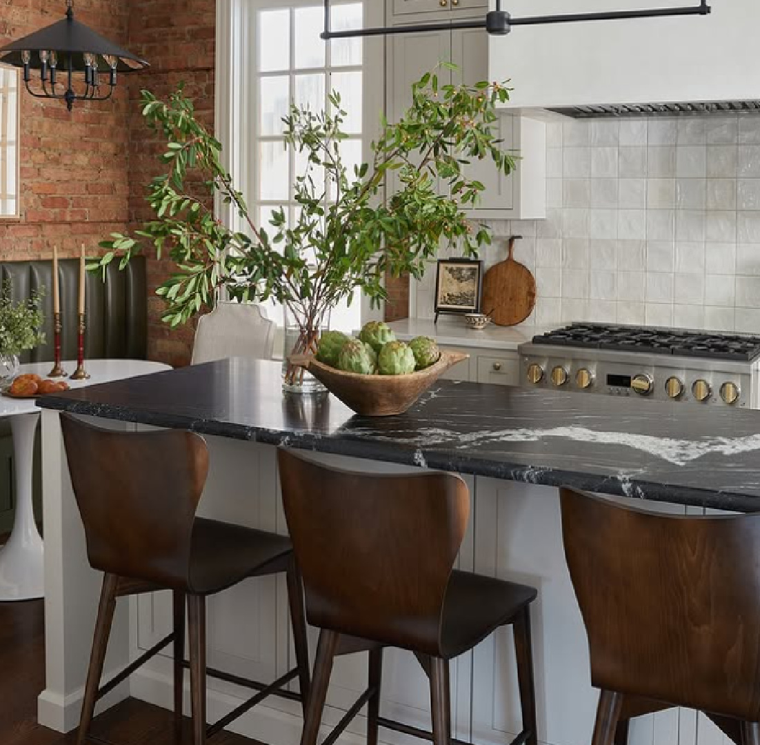 Beautiful kitchen by M+M Interior Design with Zellige backsplash.