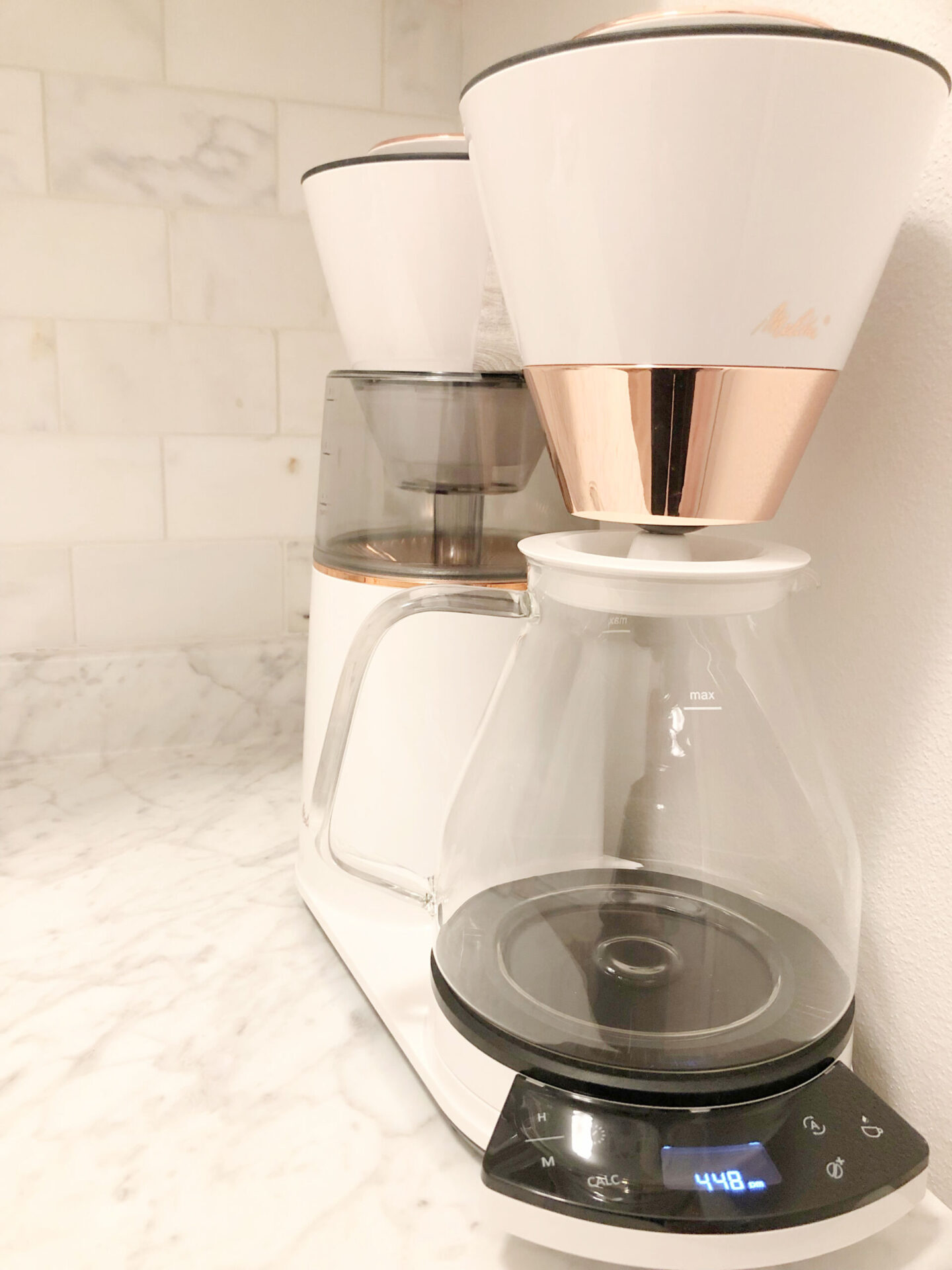 Ooh la la luxury with this Melitta Vision 12-cup coffee maker with 180 degree swivel dashboard! Love how the white and copper complement my modern French kitchen. #coffeemakers #kitchenelectronics #coffeelovers