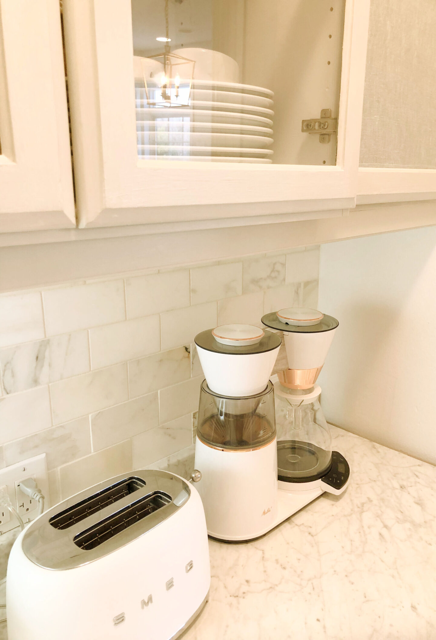 Ooh la la luxury with this Melitta Vision 12-cup coffee maker with 180 degree swivel dashboard! Love how the white and copper complement my modern French kitchen. #coffeemakers #kitchenelectronics #coffeelovers