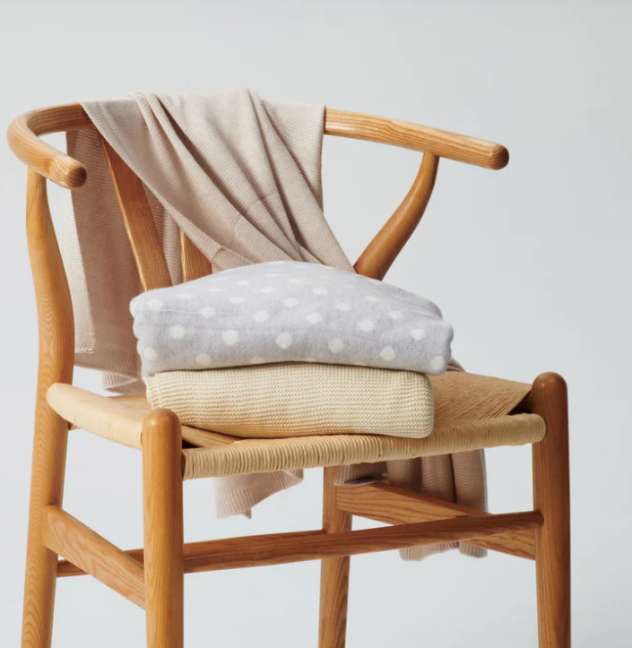 WovenWoven brand grey and white ultrafine Australian merino wool baby blanket with polka dots. #babyblankets #australianmerino #woolblankets