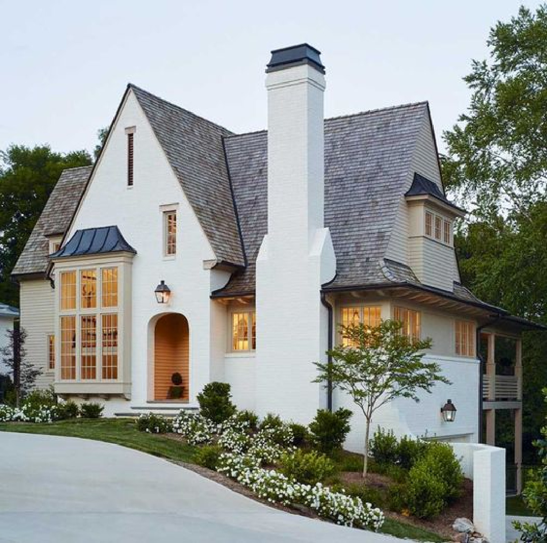 Beautiful white modern Tudor house exterior - Dixon Kirby.