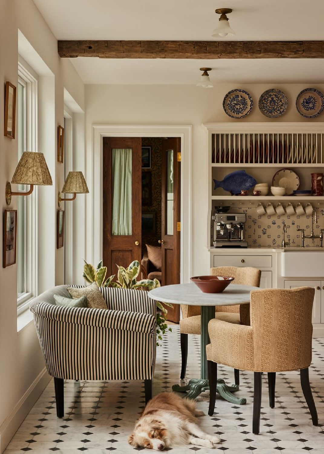 Charming Charleston kitchen with cozy dining and farm sink in historic downtown house - design: @basic_projects, photo: Nicole Franzen, feature in AD.