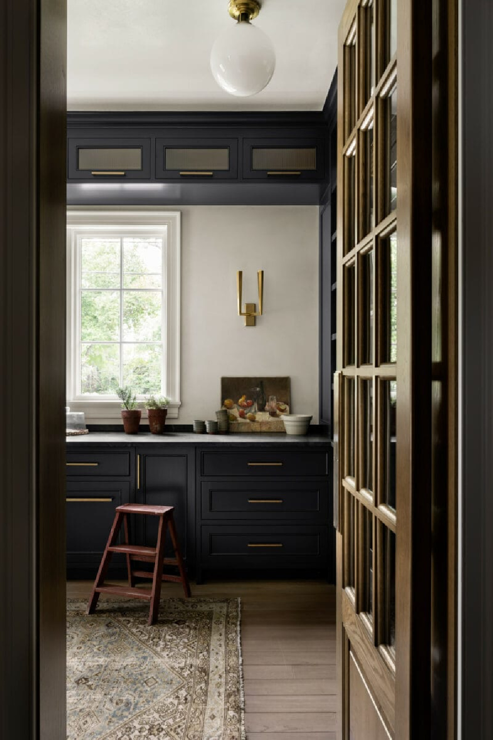 Benjamin Moore Midnight Oil kitchen cabinets - Studio McGee. #benjaminmooremidnightoil