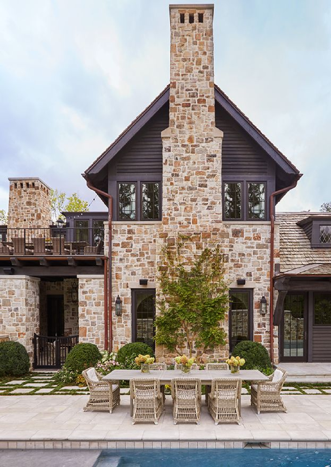 Beautiful stone on a home with interior design by Beth Webb.