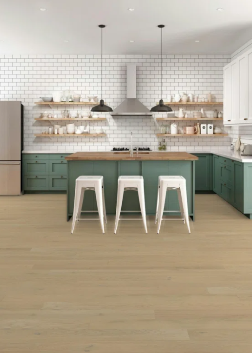 French chateau white oak engineered wood flooring in a modern farmhouse industrial kitchen with green cabinets. #engineeredflooring #ad