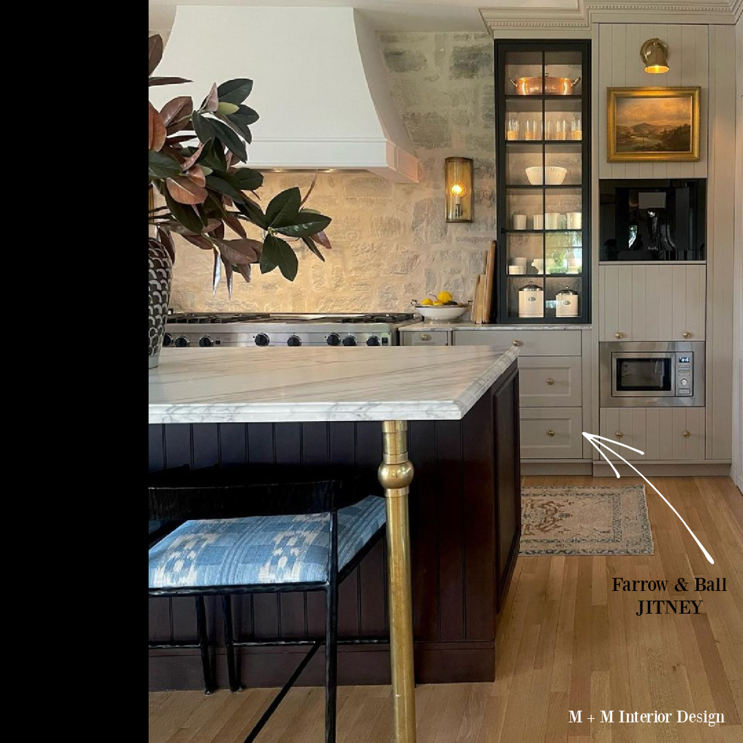 Beautiful kitchen with stone wall backsplash by M+M Interior Design. #naturalstone #stonebacksplash