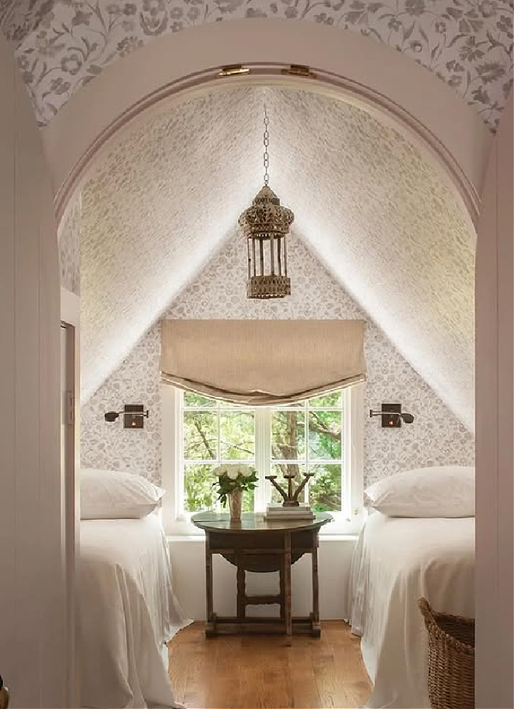 Attic bedroom with arched door. Timeless interior design by Shannon Bowers with nods to European antiques, patina, understated elegance, and sophisticated simplicity. #shannonbowers #timelessinteriors