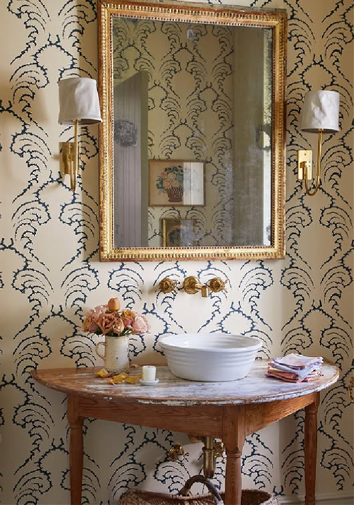 Beautiful powder bath with fresh roses. Timeless interior design by Shannon Bowers with nods to European antiques, patina, understated elegance, and sophisticated simplicity. #shannonbowers #timelessinteriors