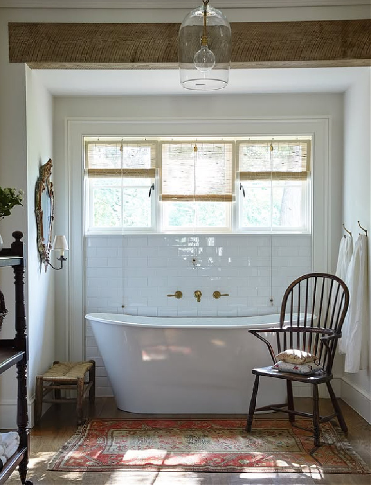 Old World bath with soaking tub. Timeless interior design by Shannon Bowers with nods to European antiques, patina, understated elegance, and sophisticated simplicity. #shannonbowers #timelessinteriors