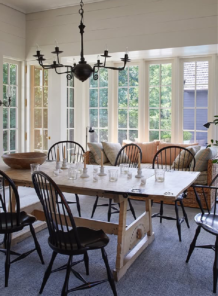 Shannon Bowers designed dining area with window seating, Windsor chairs and sophisticated simplicity.