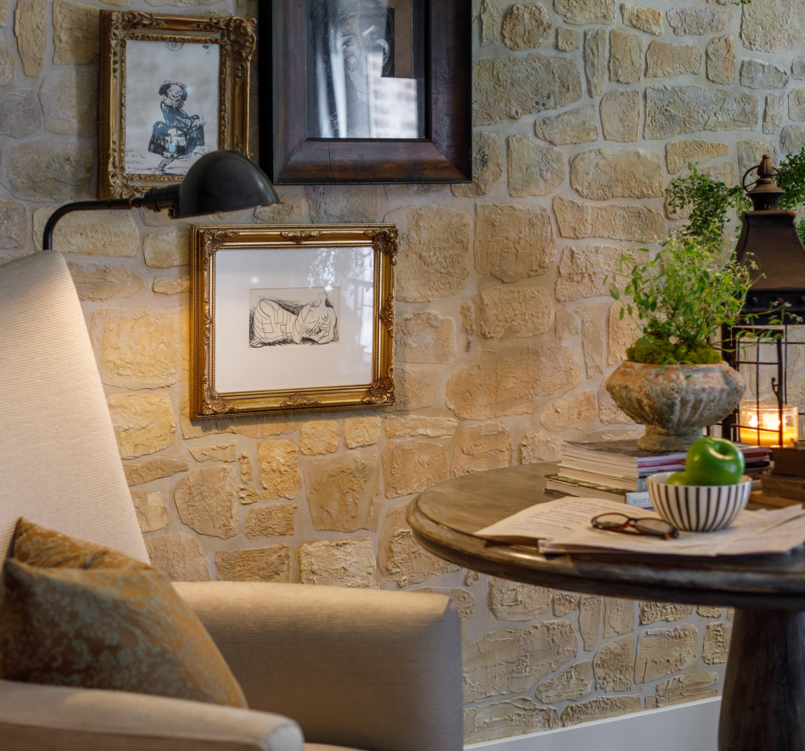 Rustic elegance in an Old World style home with stone wall created with stencil kit from @thedetalles. #rusticelegance #stonewallstencil #fauxstone #thedetalles