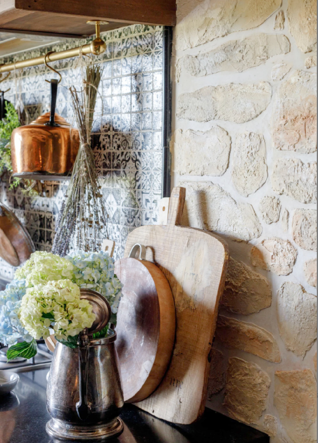 Rustic elegance in an Old World style home with stone wall created with stencil kit from @thedetalles. #rusticelegance #stonewallstencil #fauxstone #thedetalles