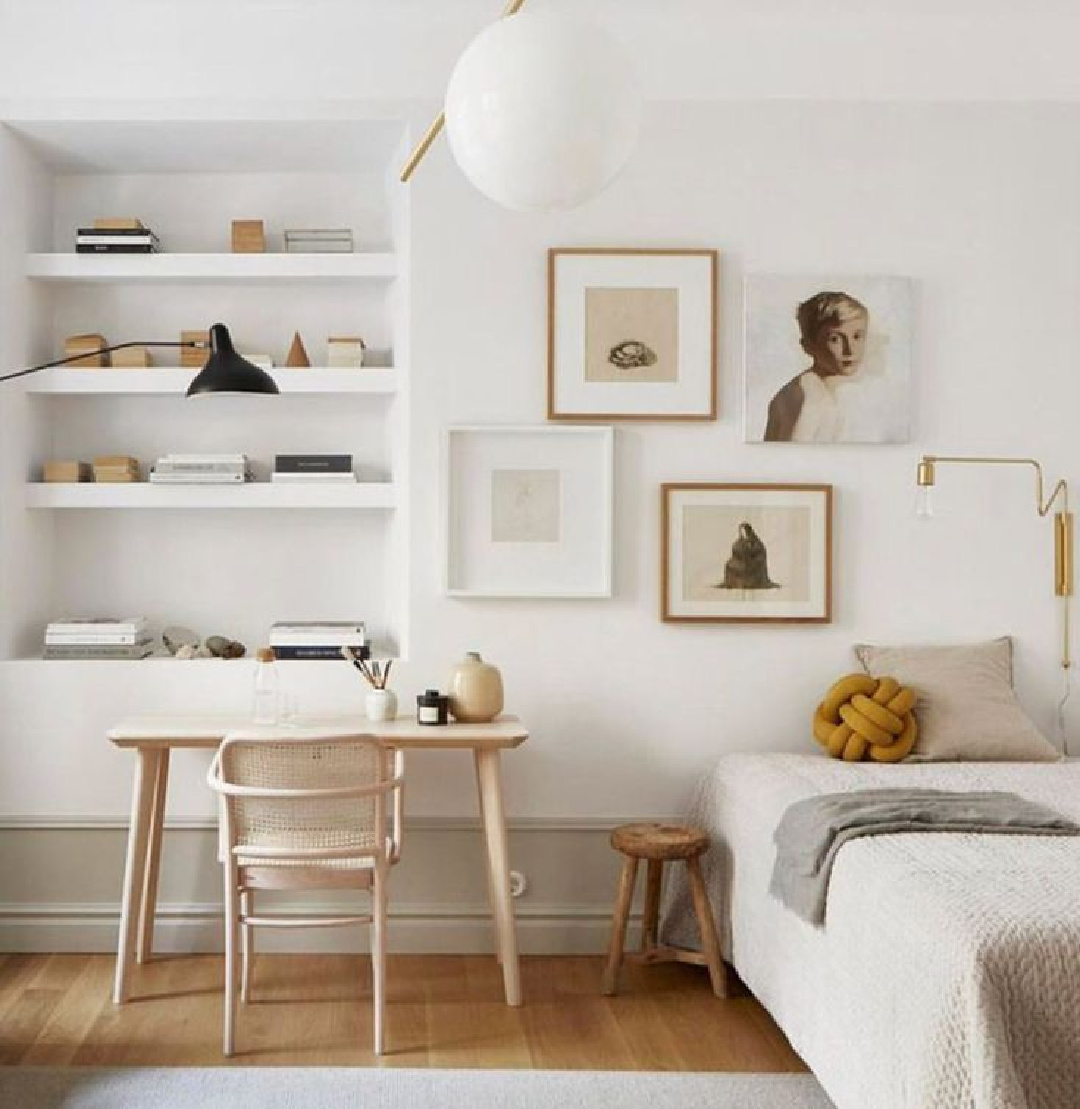 Modern Scandinavian style in a Stockholm apartment bedroom with white gallery wall and chic lighting (styling: Josefin Haag) - FANTASTIC FRANK Real Estate.