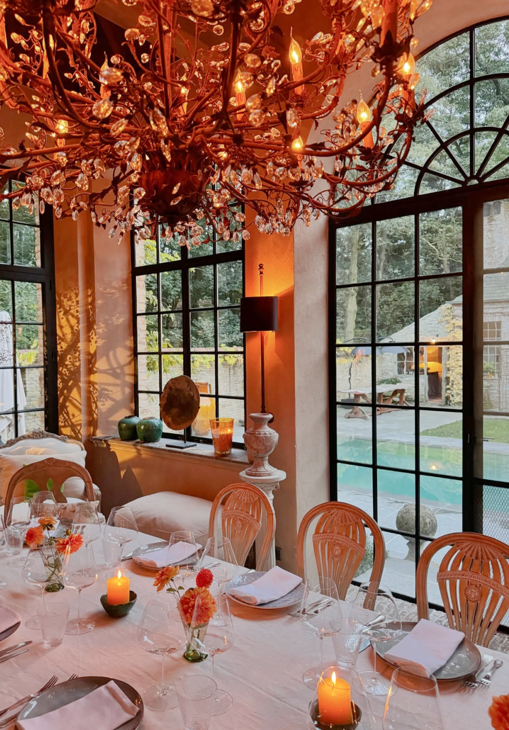 Warm ambient lighting in a Belgium orangery - Greet Lefèvre of Belgian Pearls. #belgianhomes #belgianstyle