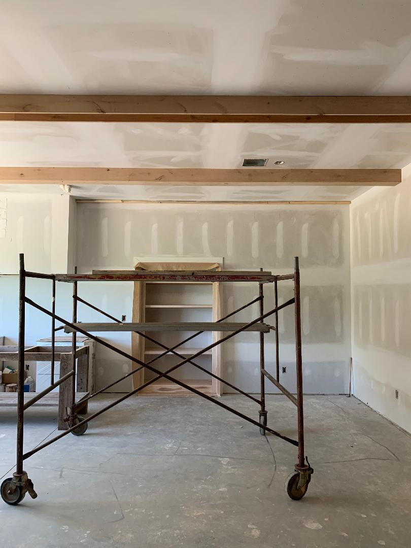 BEFORE - as Rosalia (The Detalles) created the home of her dreams and developed a stone wall stencil kit.