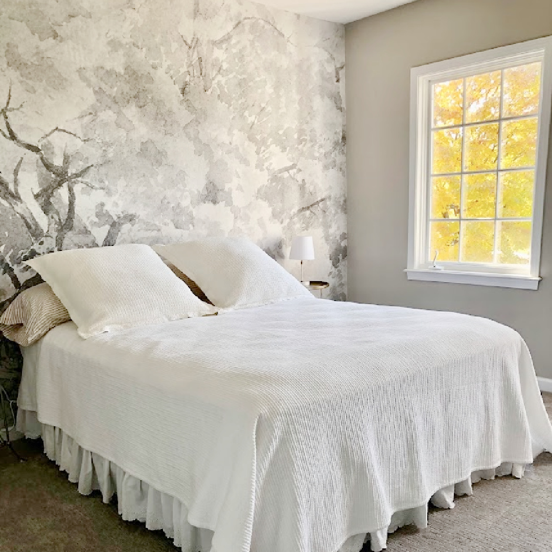 Hello Lovely's guest bedroom with grisaille mural wallpaper and SW Agreeable Gray walls. #photowallsweden #wallpapermural