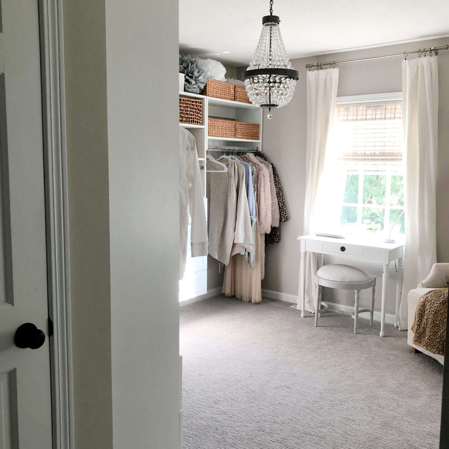 Hello Lovely's DIY customized closet dressing room at the Georgian with Venetian mirror and Empire style chandelier.