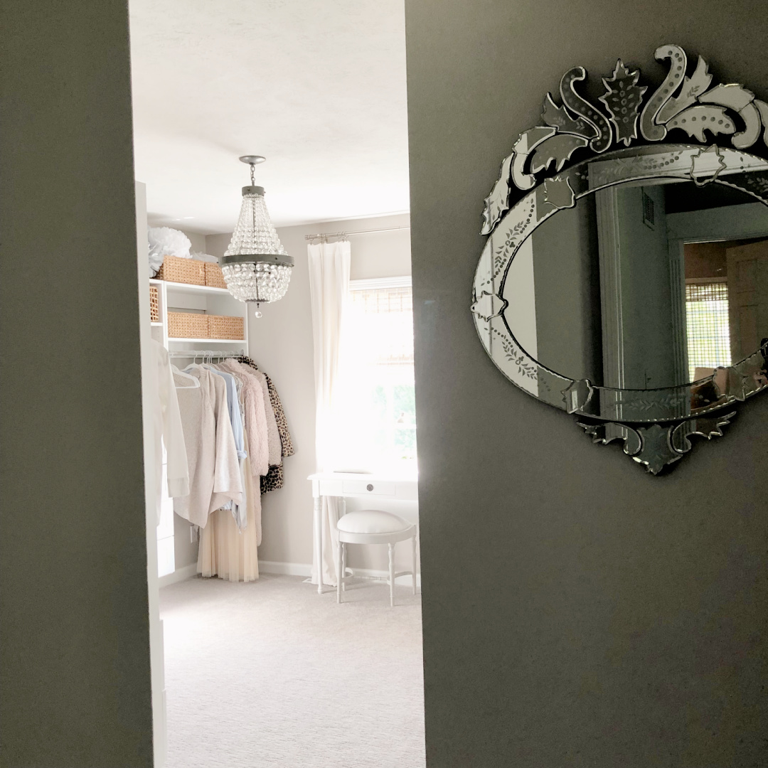 Hello Lovely's DIY customized closet dressing room at the Georgian with Venetian mirror and Empire style chandelier.