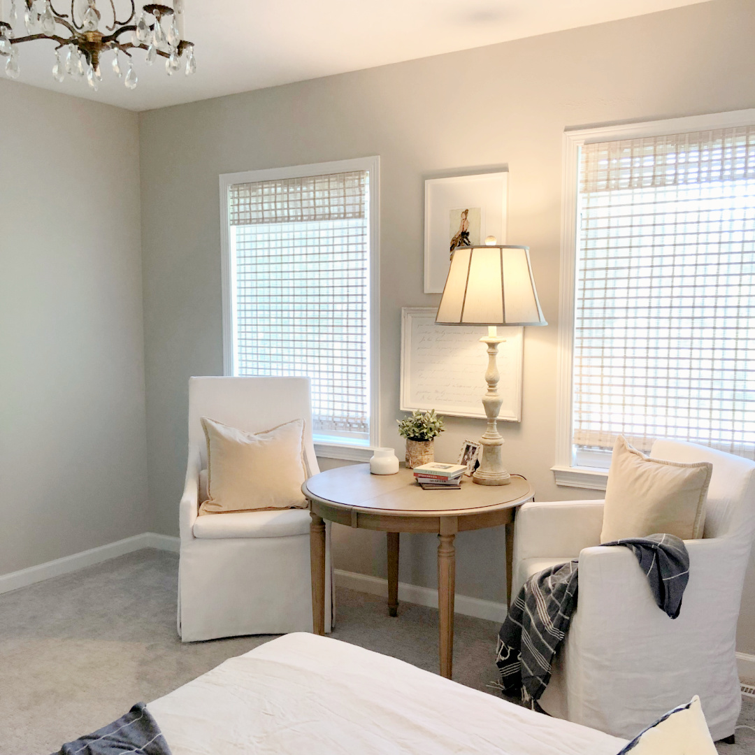 Hello Lovely's Scandinavian inspired guest bedroom with wallpaper mural and SW Agreeable Gray walls.