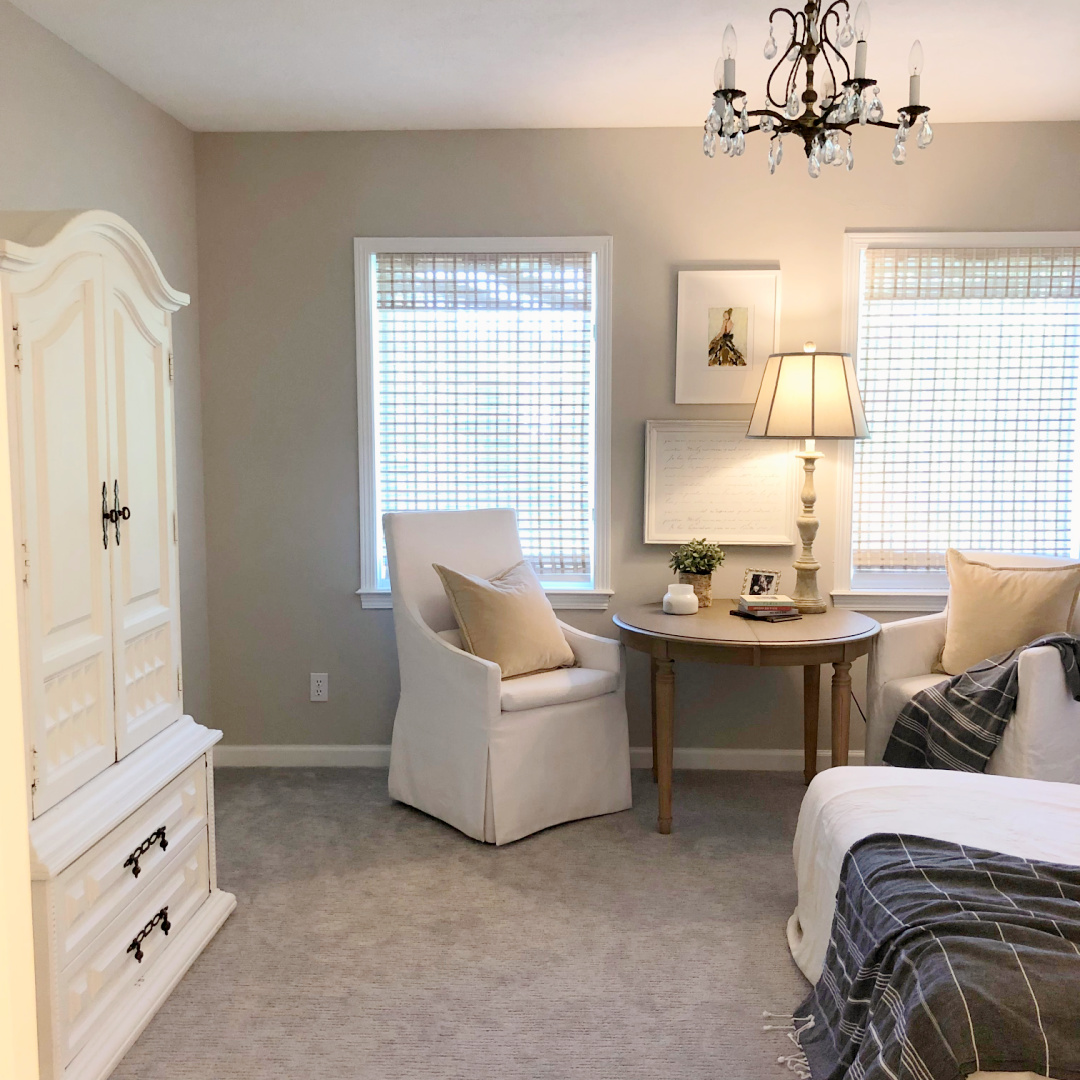 Hello Lovely's Scandinavian inspired guest bedroom with wallpaper mural and SW Agreeable Gray walls.