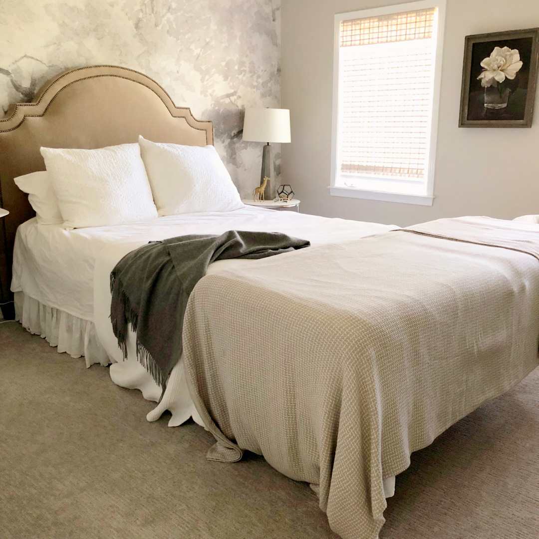 Hello Lovely's guest bedroom with wallpaper mural and walls painted SW Agreeable Gray.