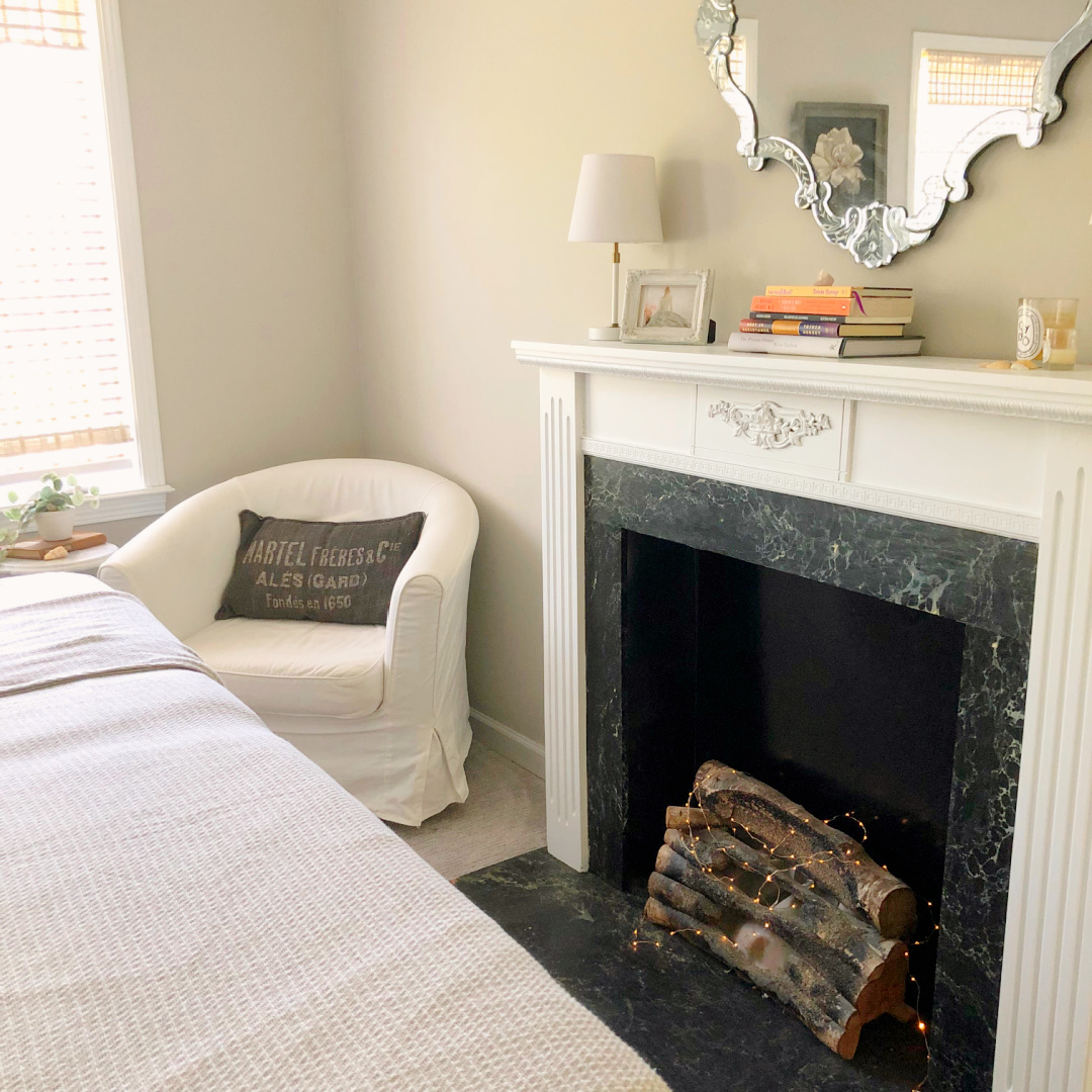 Hello Lovely's guest bedroom with wallpaper mural and walls painted SW Agreeable Gray.