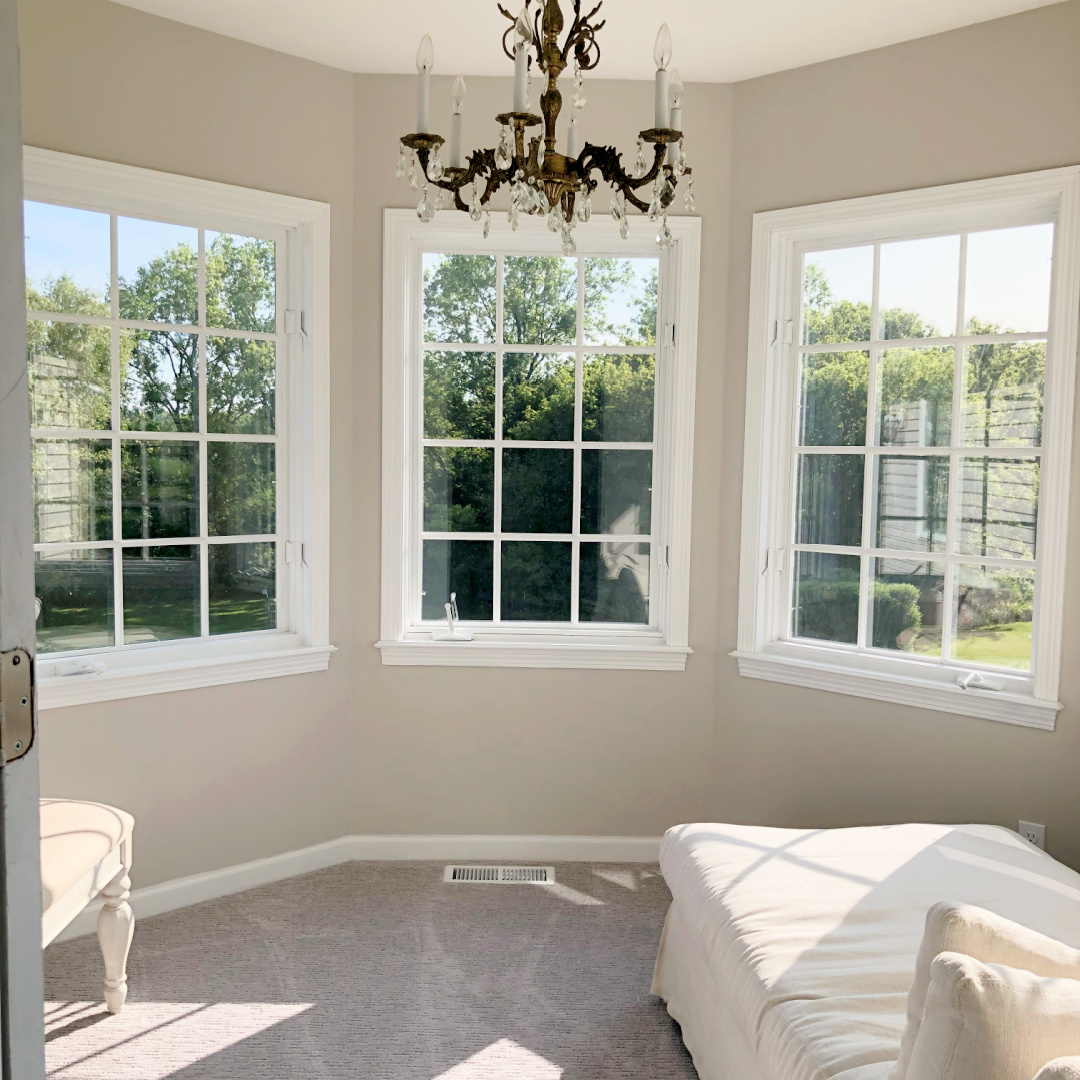 SW Agreeable Gray in Hello Lovely's turret sitting room in primary bedroom overlooking forest preserve.
