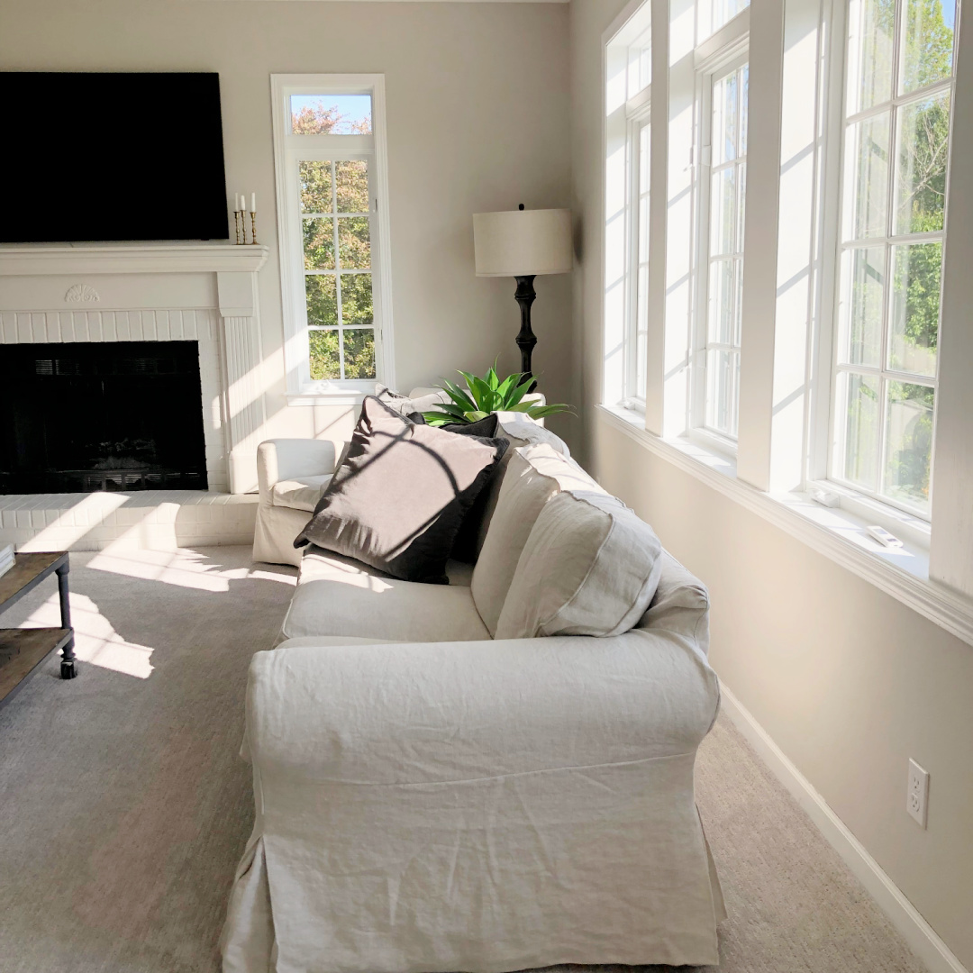 Hello Lovely's family room with SW Agreeable Gray.