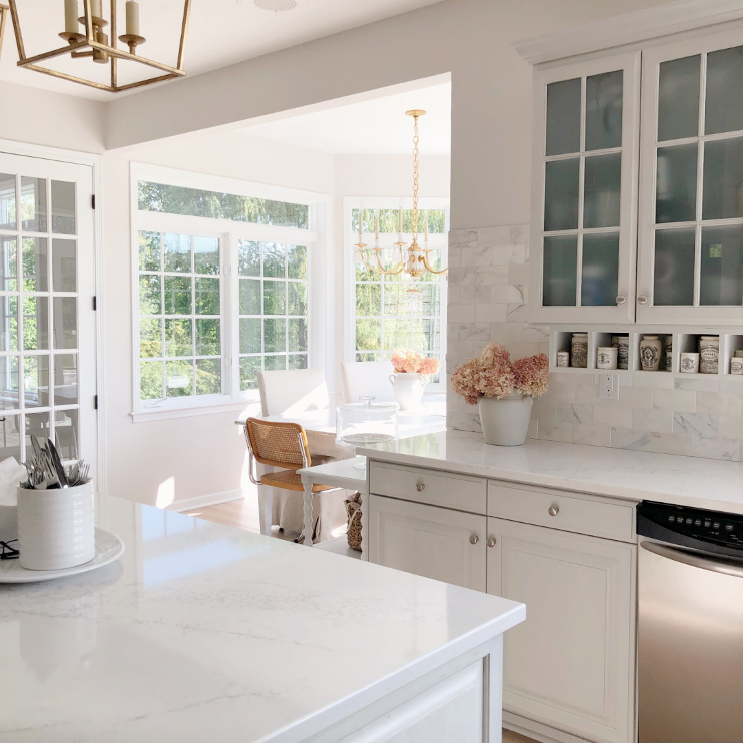 Hello Lovely's modern French kitchen with LX Hausys Viatera Muse white quartz countertops.