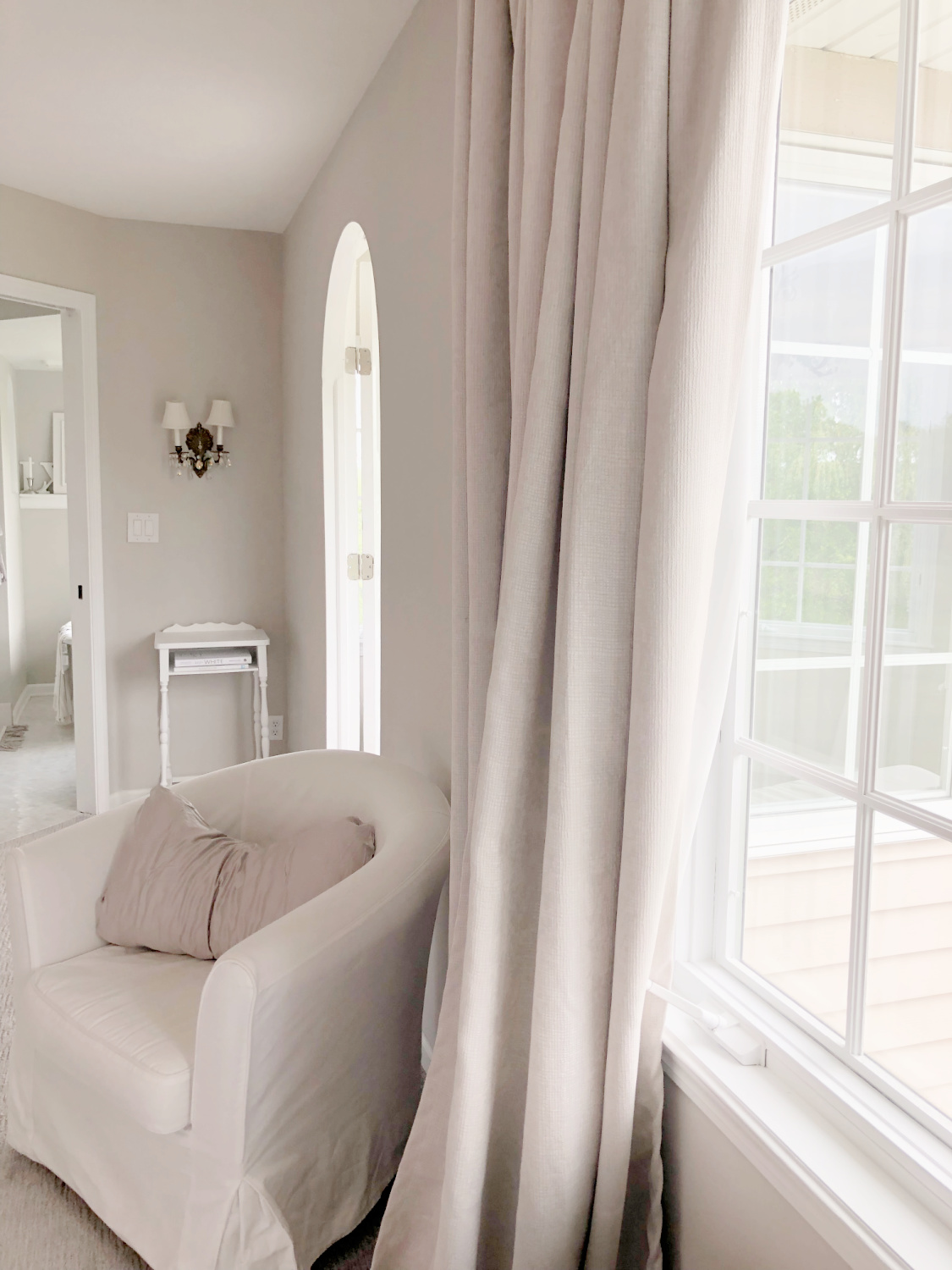 Hello Lovely's bedroom painted SW Agreeable Gray.