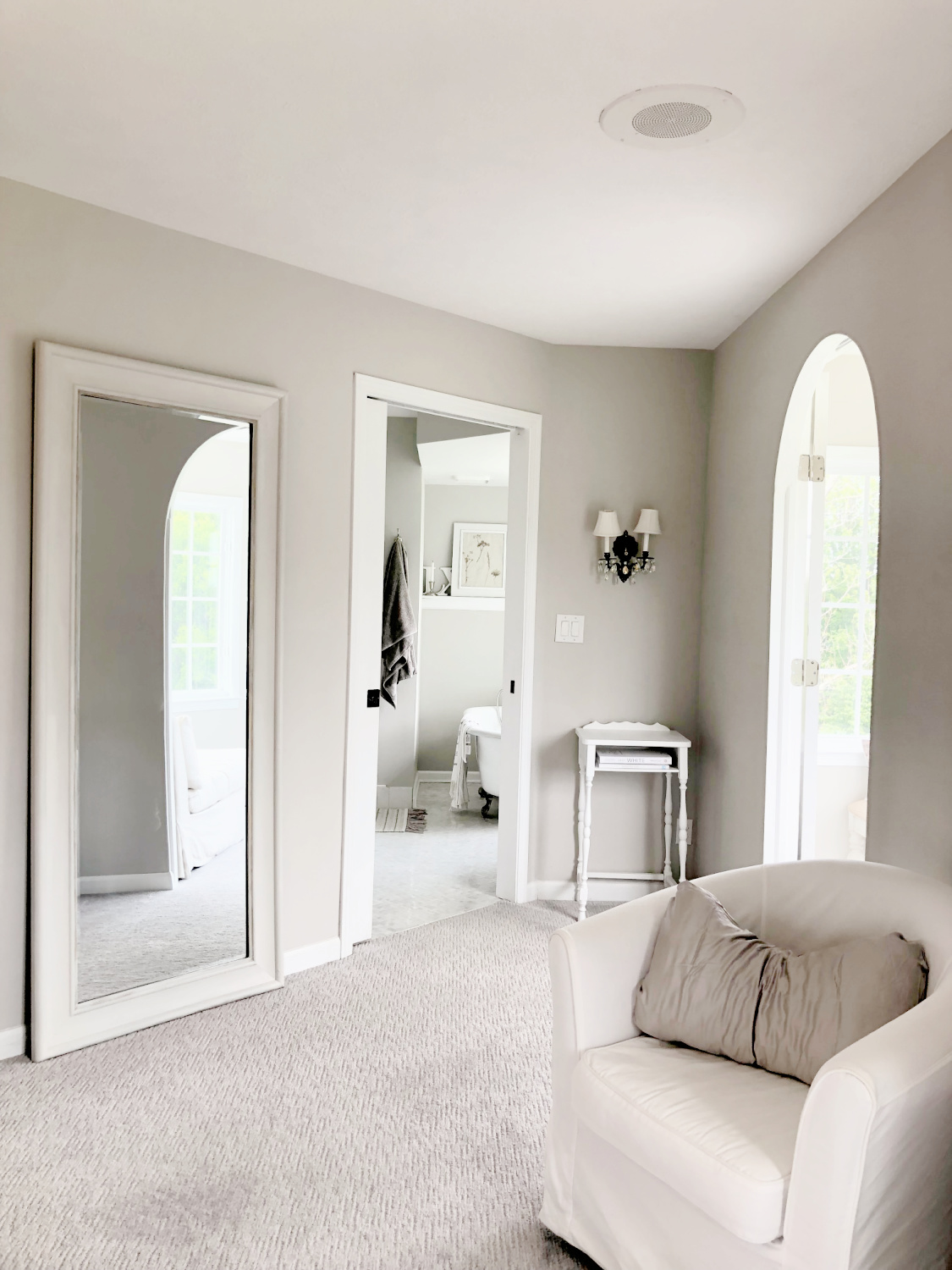 Hello Lovely's serene greige bedroom painted SW Agreeable Gray.