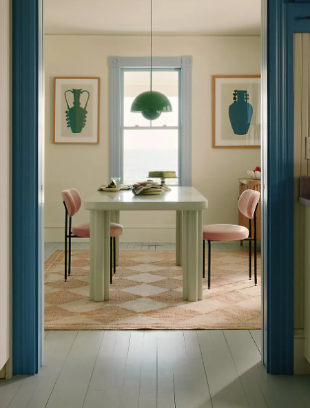 Anthropologie Erin Gates Orchard Rug in a modern dining area.