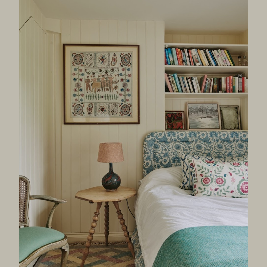 Beautiful cozy timeless English country bedroom with bookshelves behind bed by Tamsin Saunders (HomeAndFound). #timelessinteriors