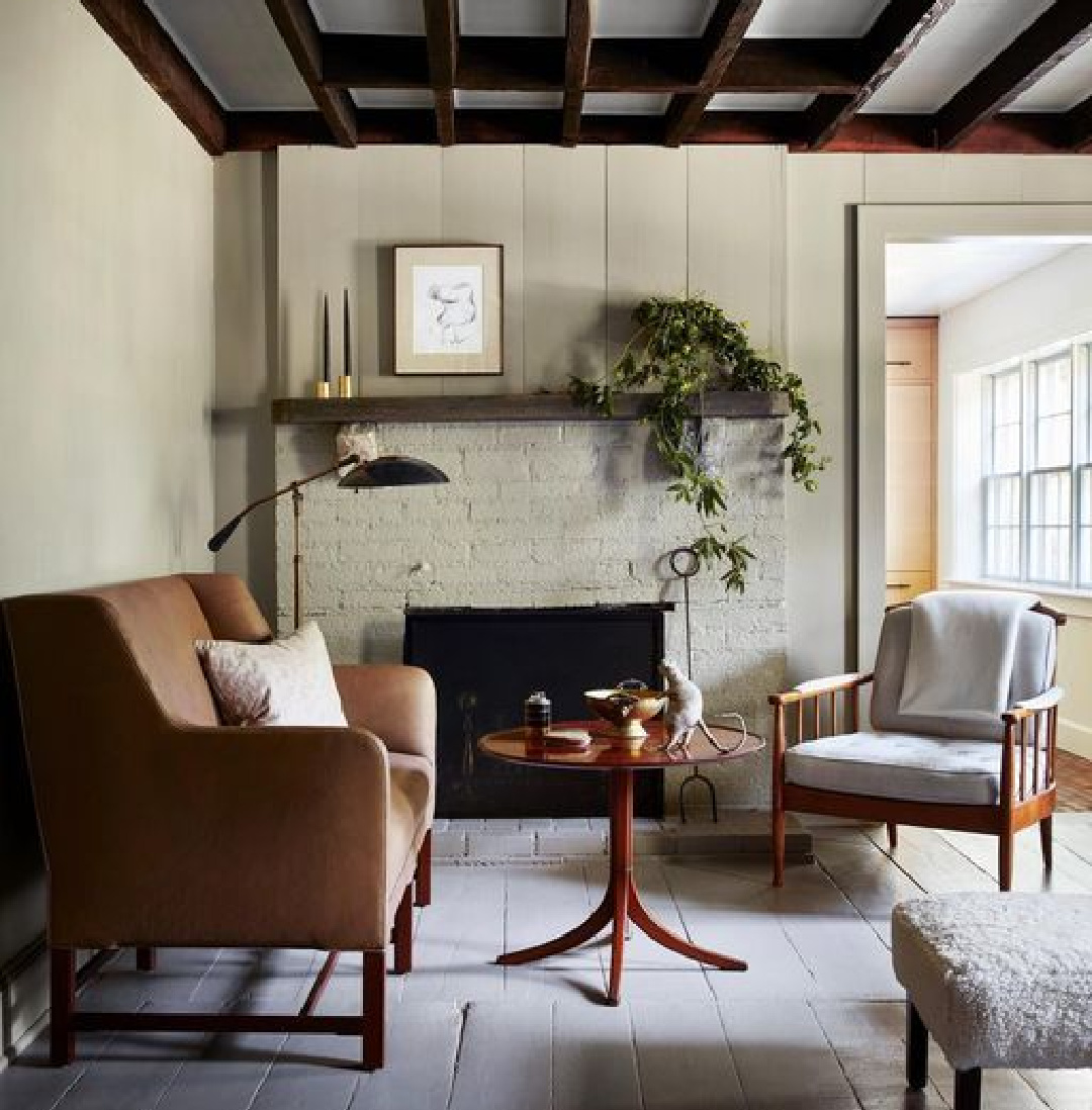 Shawn Henderson cozy New York farmhouse living area with fireplace.