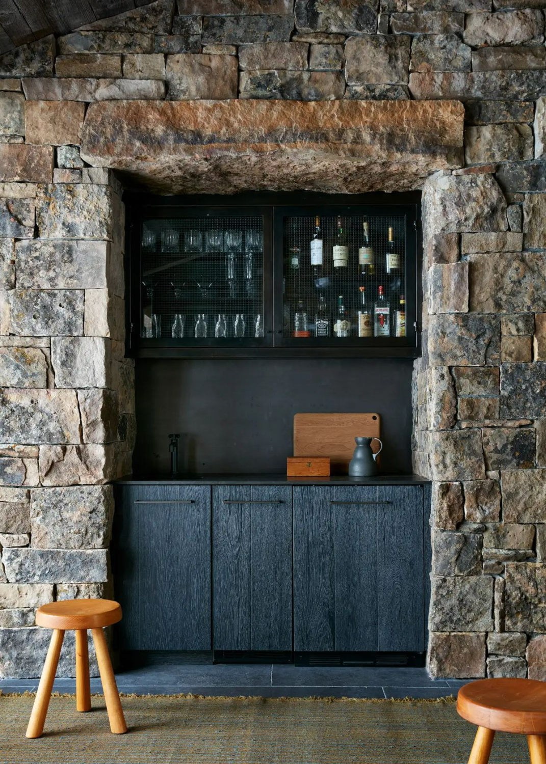 Montana ski house bar area with stone - Shawn Henderson design.