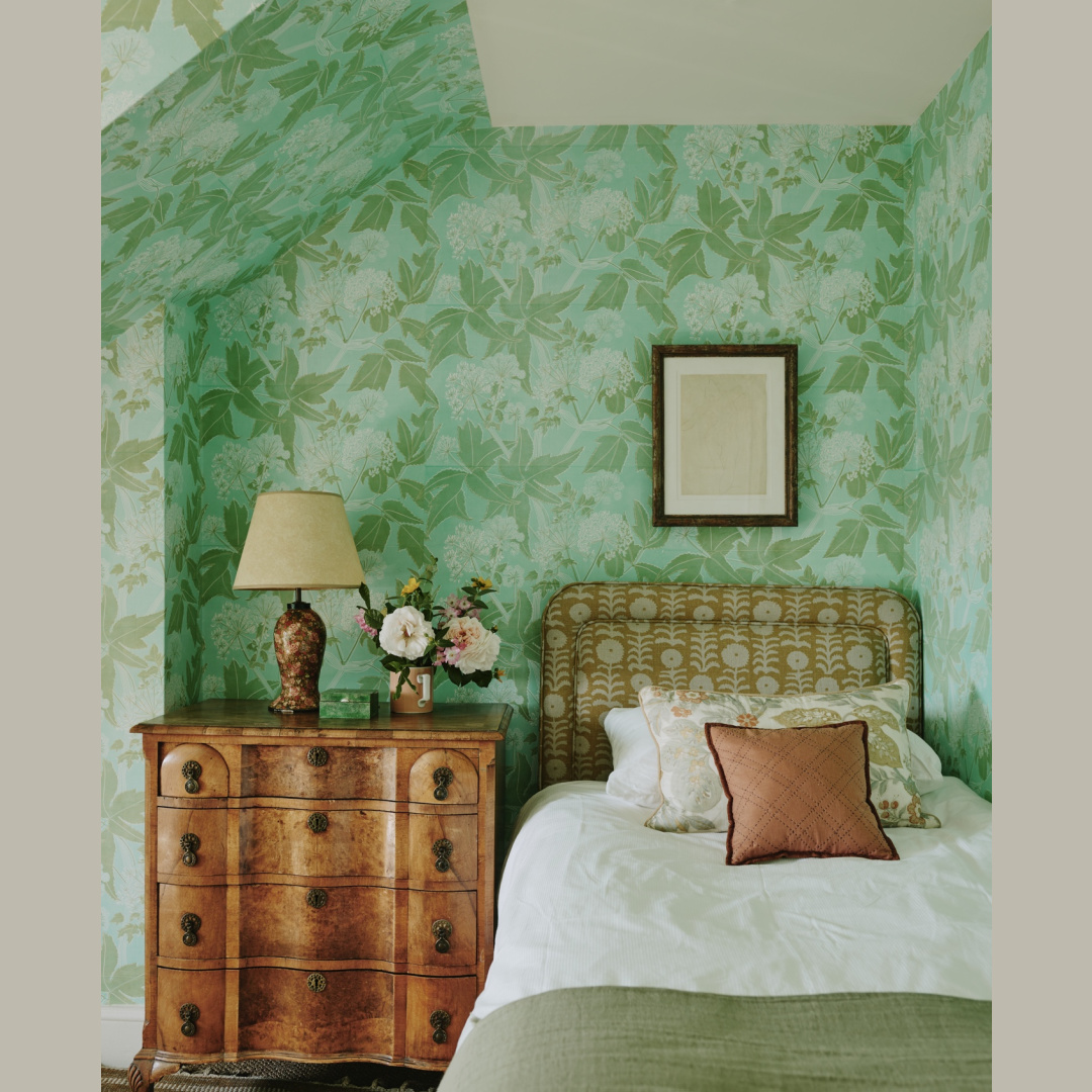 Beautiful cozy timeless English country bedroom with romantic green floral wallpaper - design by Tamsin Saunders (HomeAndFound). #timelessinteriors