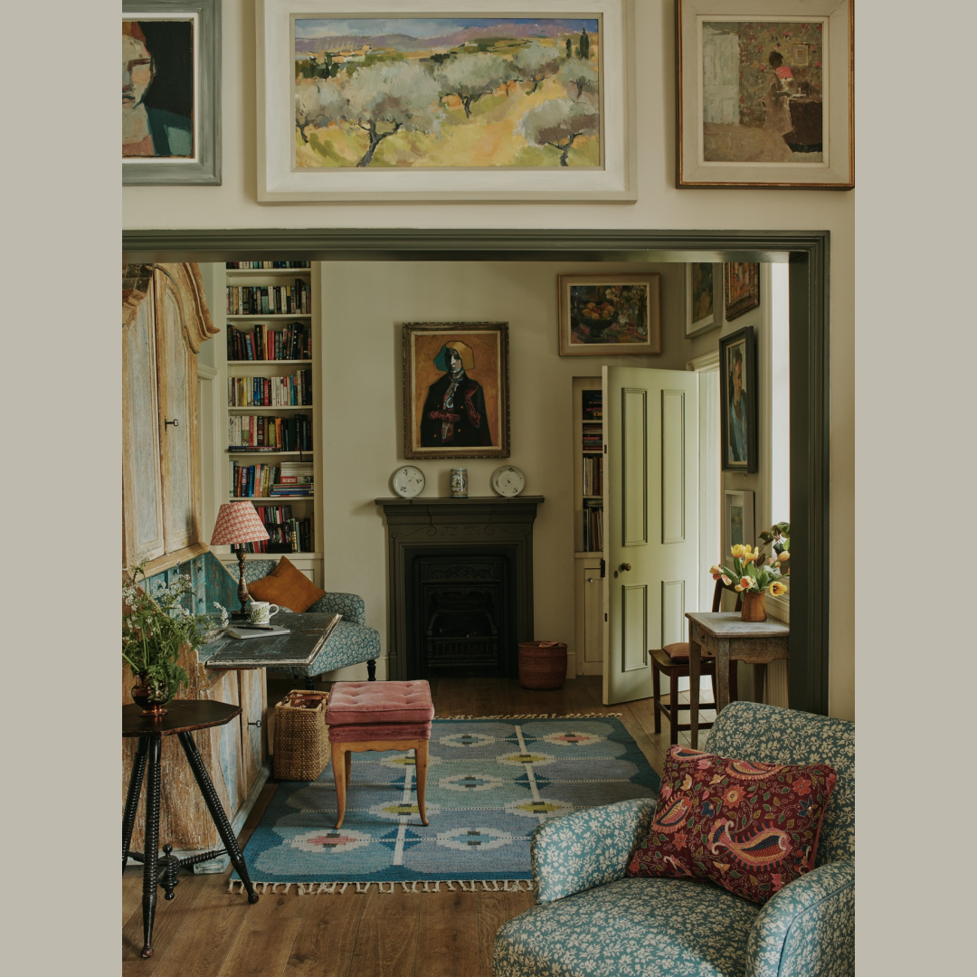 Beautiful cozy timeless English country interior with antique secretary and art hung near ceiling - Tamsin Saunders (HomeAndFound). #timelessinteriors