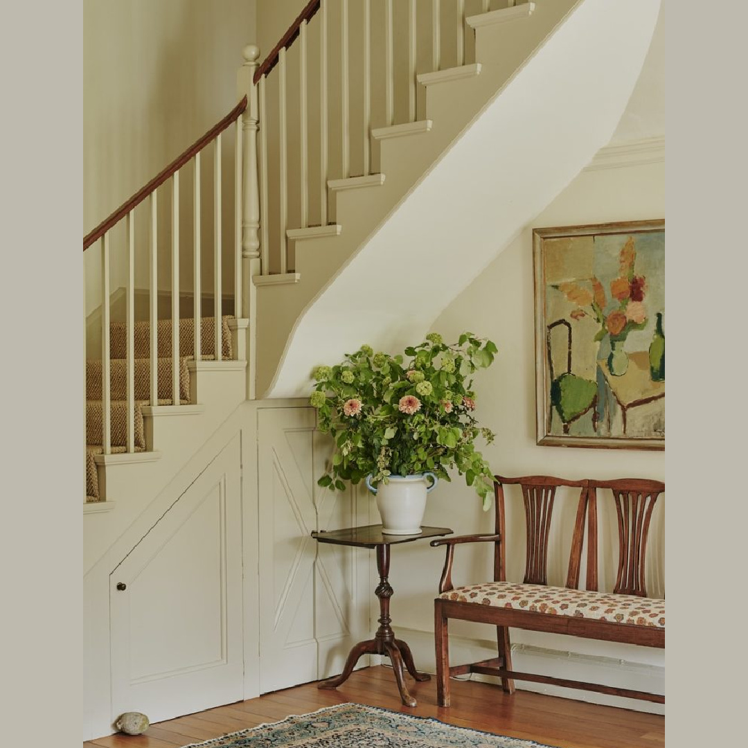 Beautiful cozy timeless English country foyer with staircase and bench - designed by Tamsin Saunders (HomeAndFound). #timelessinteriors