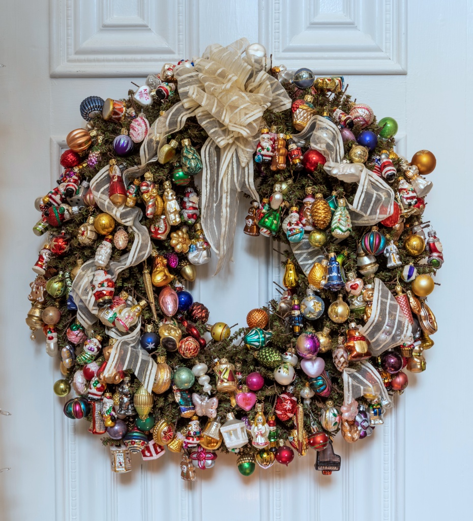 Fanciful Christmas wreath on door featured in VISIONS OF CHRISTMAS by Fifi O'Neill (photos by Mark Lohman).