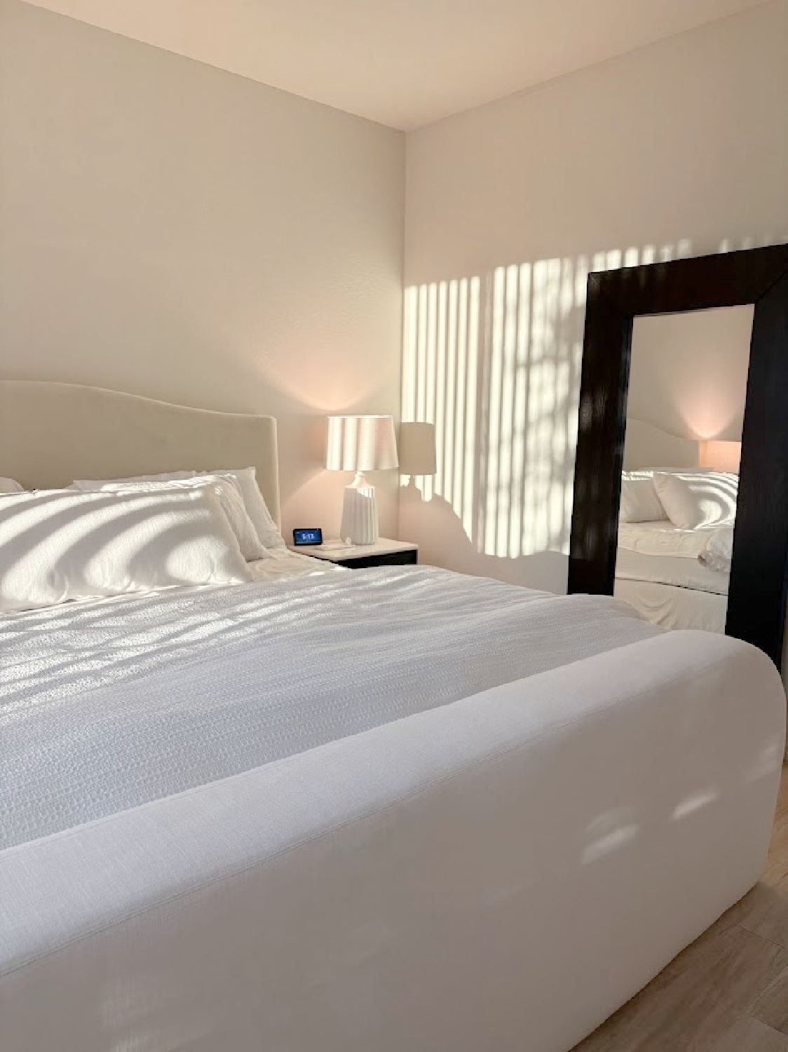 DURING - Hello Lovely's primary ebony and ivory serene bedroom coming together at the snowbird sanctuary project.