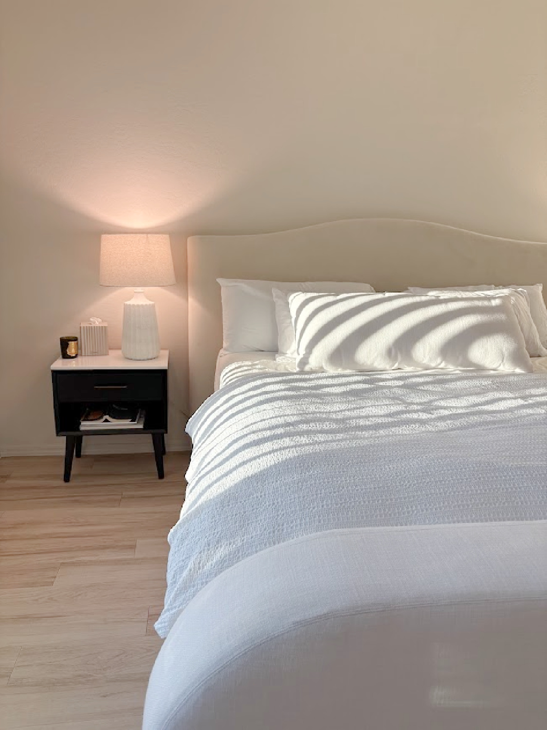 DURING - Hello Lovely's primary ebony and ivory serene bedroom coming together at the snowbird sanctuary project.