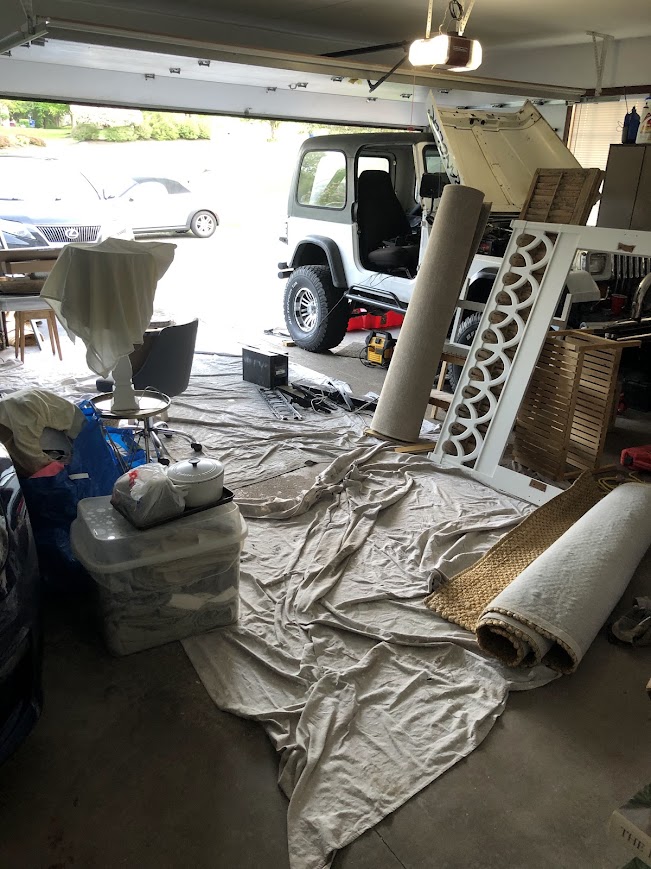 Moving furniture and belongings from Illinois to Arizona into a U-Haul truck.