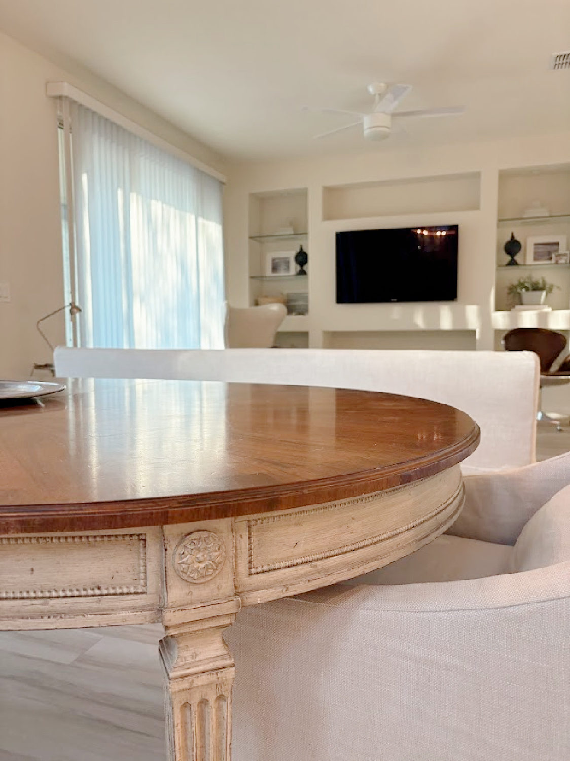 Detail of our vintage classic dining table in Hello Lovely's snowbird sanctuary dining room with European country style.