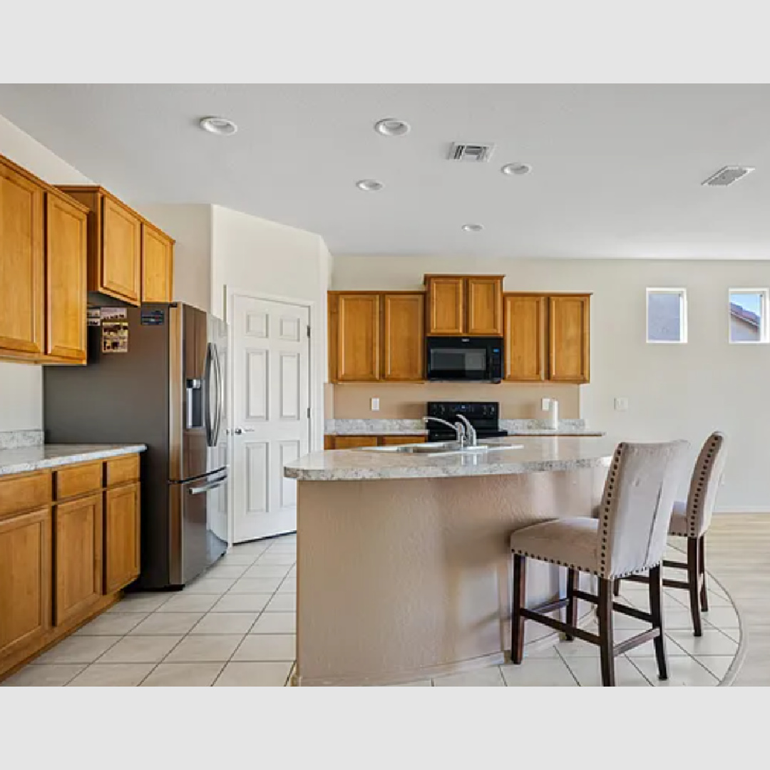Before - kitchen with white ceramic tile in Hello Lovely's snowbird sanctuary project.