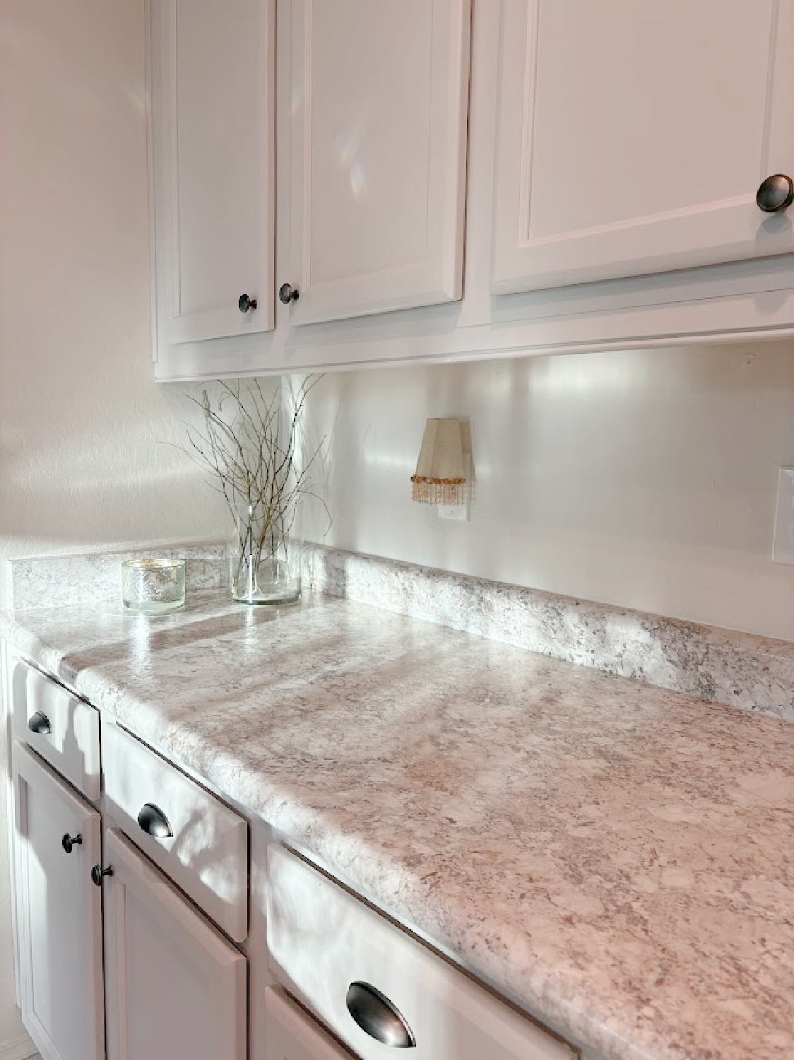 Agreeable Gray (Sherwin-Williams) painted kitchen cabinets in our Arizona snowbird house - Hello Lovely.