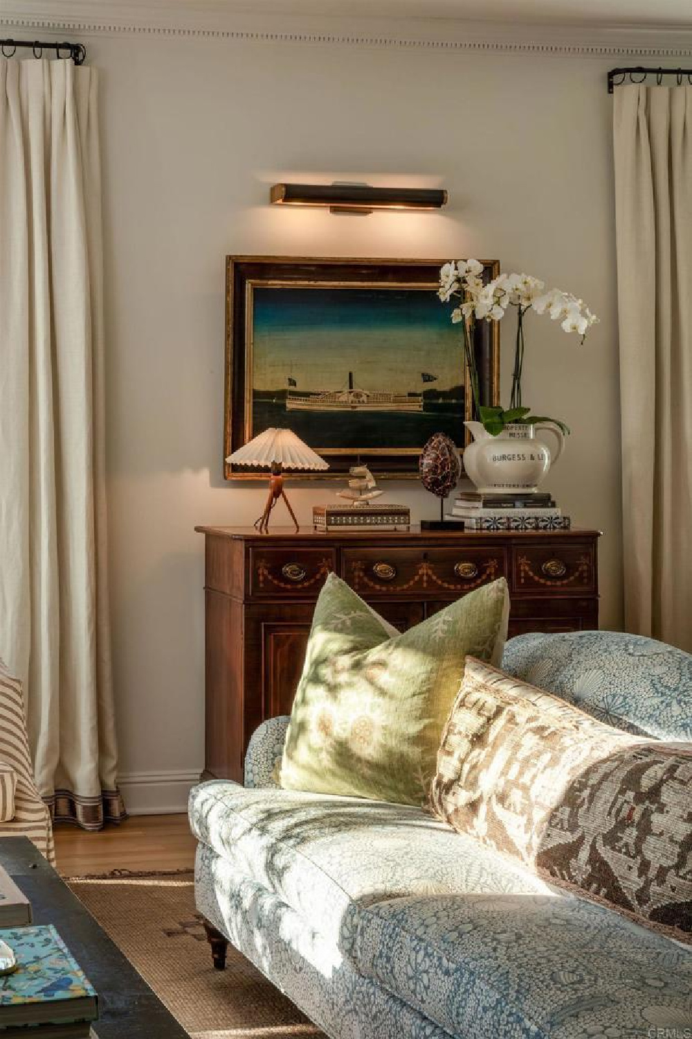 Antiques and collected art in Leslie Martin's stunning traditional coastal home 5735 Dolphin in La Jolla, CA with interiors by M+M Interior Design. Offered by @nelsonbrothersrealestate