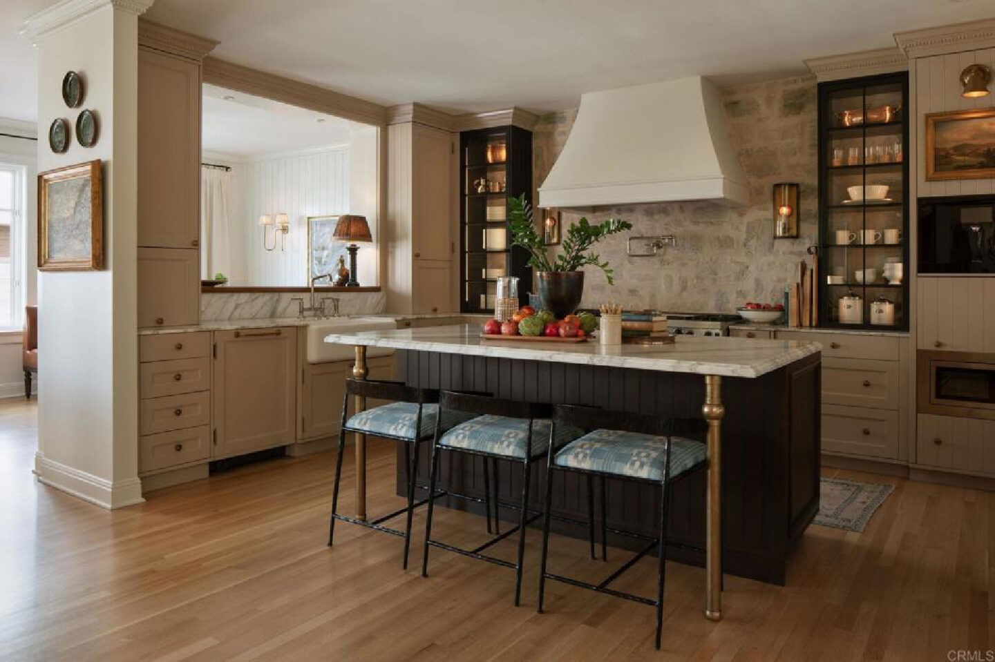 Leslie Martin's European country inspired kitchen with stone in stunning traditional coastal home 5735 Dolphin in La Jolla, CA with interiors by M+M Interior Design. Offered by @nelsonbrothersrealestate