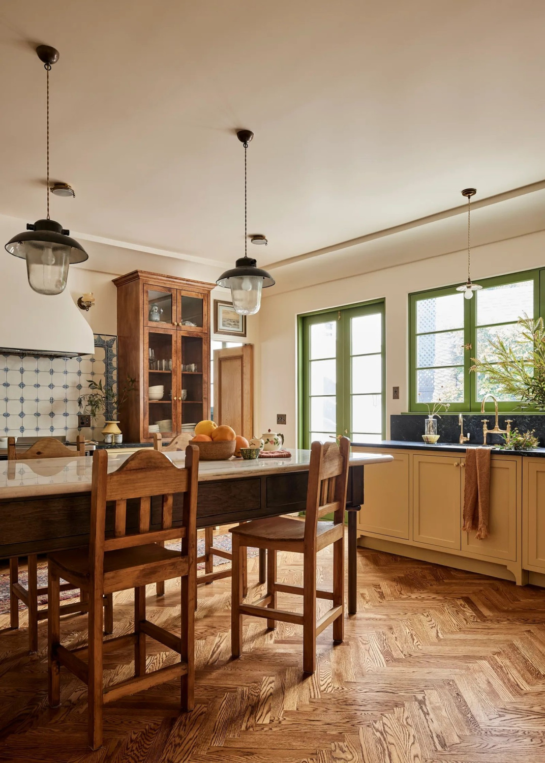 Farrow & Ball Slipper Satin on walls, Hay on cabinets, and Card room Green on window trim in bespoke kitchen by Jamie Haller in AD (photo by Jenna Peffley). #farrowandballslippersatin #farrowandballhay