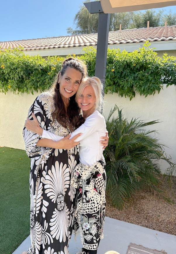 Michele of Hello Lovely Studio with friend at her tropical home.